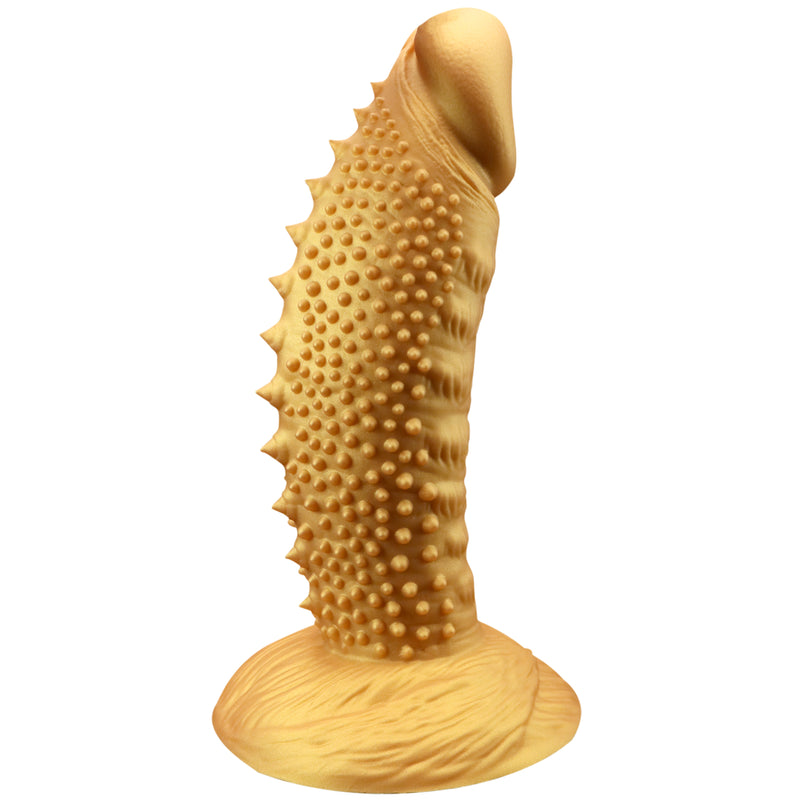 Golden silicone fantasy dildo with a realistic glans and bumpy shaft